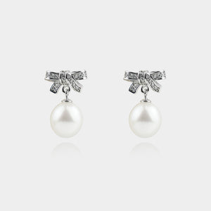 SPARKLING BOW WITH PEARL EARRINGS
